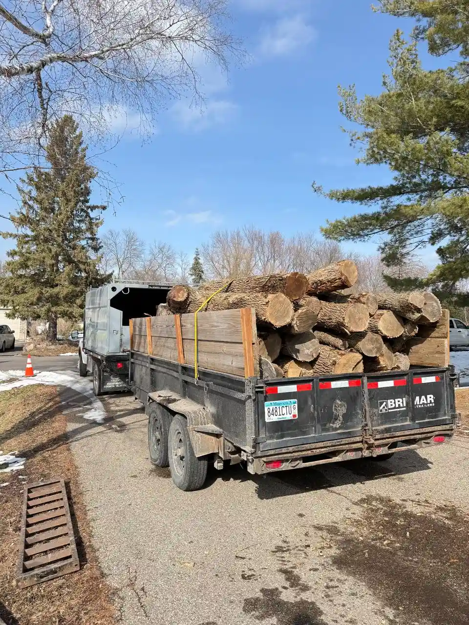 KVN Pro Tree Service truck with wood chipper for tree hauling in Minneapolis MN